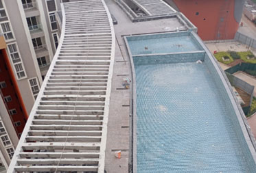 Utopia Paradise : Swimming pool flooring works completed and drain granite works in progress - Status as of January 2025