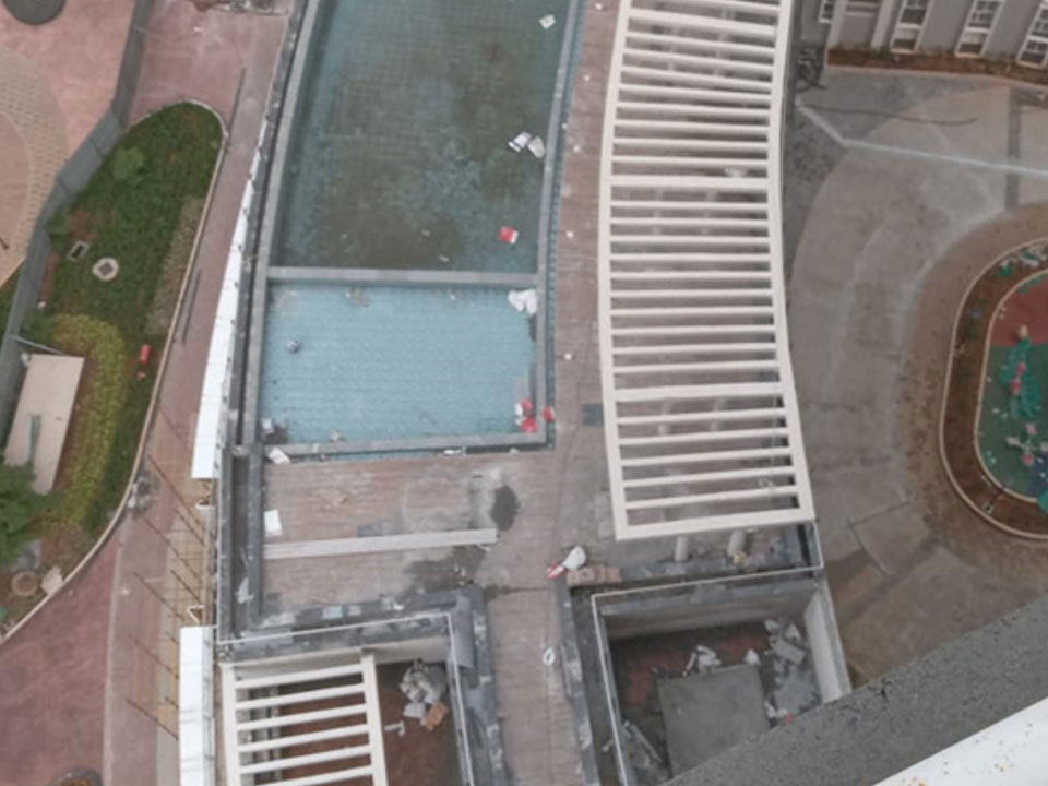 Utopia Paradise : Swimming pool Flooring works completed and drain granite works are in progress - Status as of May 2025