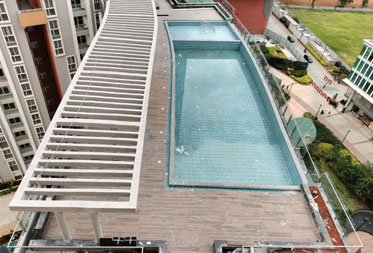 Utopia Paradise : Swimming pool Flooring works completed and drain granite works are in progress - Status as of June 2025